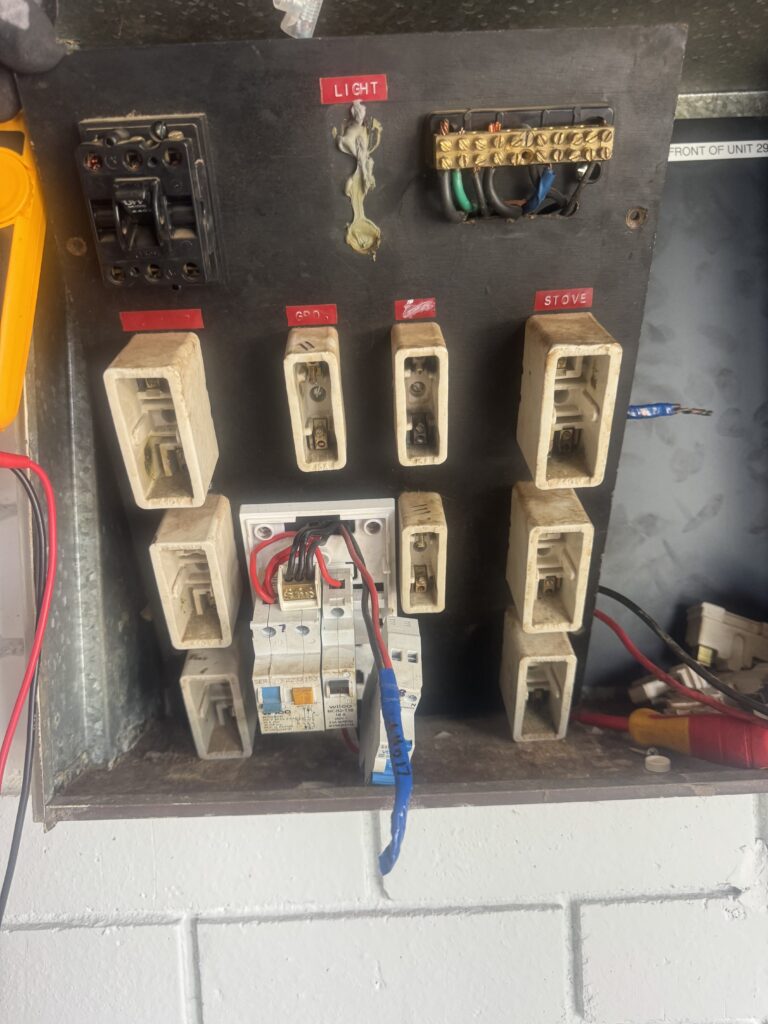 Old residential fuse box and switchboard upgrade in progress