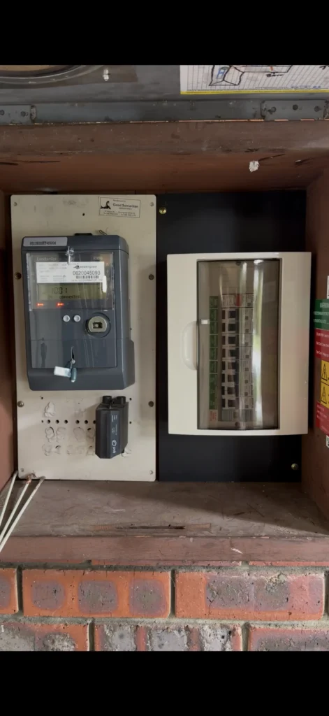 Newly installed switchboard and electricity meter in an outdoor meter box
